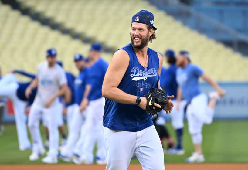 Los Angeles, California October10, 2022-Dodgers pitcher Clayton Kershaw has fun during a workout.