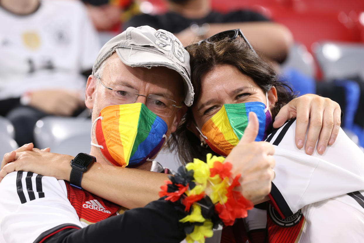 MUNICH, GERMANY - JUNE 23: Fans of Germany wearing rainbow masks gesture prior to the UEFA Euro 2020 Championship Group F match between Germany and Hungary at Allianz Arena on June 23, 2021 in Munich, Germany. (Photo by Alexander Hassenstein/Getty Images)