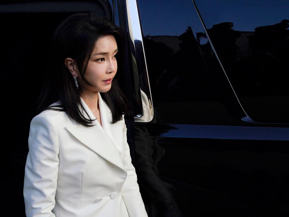 South Korea's first lady Kim Keon Hee exits her motorcade in Washington.