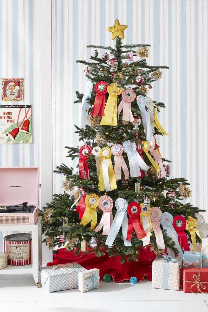 <p>This tree—a fit for those who love creating new ideas from <a href="https://www.countryliving.com/shopping/gifts/g33633781/christmas-china-patterns/" rel="nofollow noopener" target="_blank" data-ylk="slk:vintage;elm:context_link;itc:0;sec:content-canvas" class="link ">vintage</a> finds—repurposes prize ribbons as a garland. A velvet star topper and <a href="https://www.amazon.com/s?k=shiny+brite&ref=nb_sb_noss_2&tag=syn-yahoo-20&ascsubtag=%5Bartid%7C10050.g.1251%5Bsrc%7Cyahoo-us" rel="nofollow noopener" target="_blank" data-ylk="slk:Shiny-Brite;elm:context_link;itc:0;sec:content-canvas" class="link ">Shiny-Brite</a> ornaments round out the nostalgic look.<br></p>