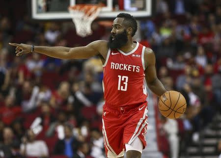 Nov 15, 2018; Houston, TX, USA; Houston Rockets guard James Harden (13) dribbles the ball during the first quarter against the Golden State Warriors at Toyota Center. Troy Taormina-USA TODAY Sports