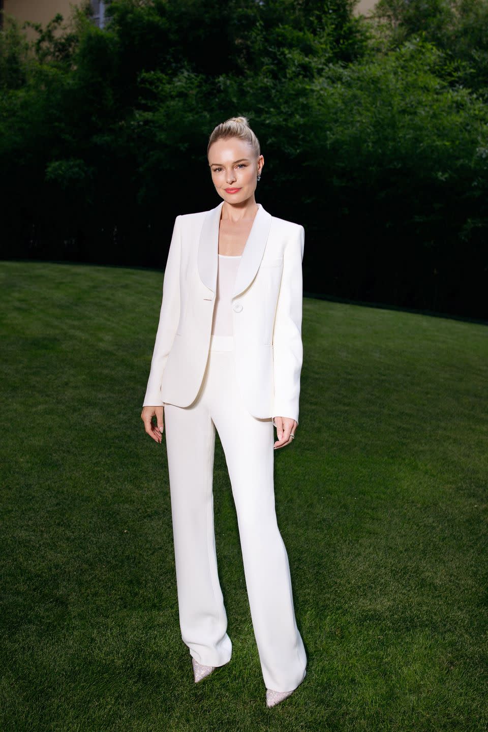 <p><strong>June 2021</strong> Kate Bosworth opted for immaculate white Armani tailoring to attend the brand's menswear show in Milan. </p>