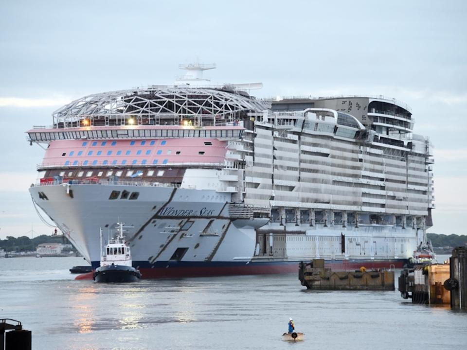 The Wonder of the Seas sitting on the water as it's under construction in France