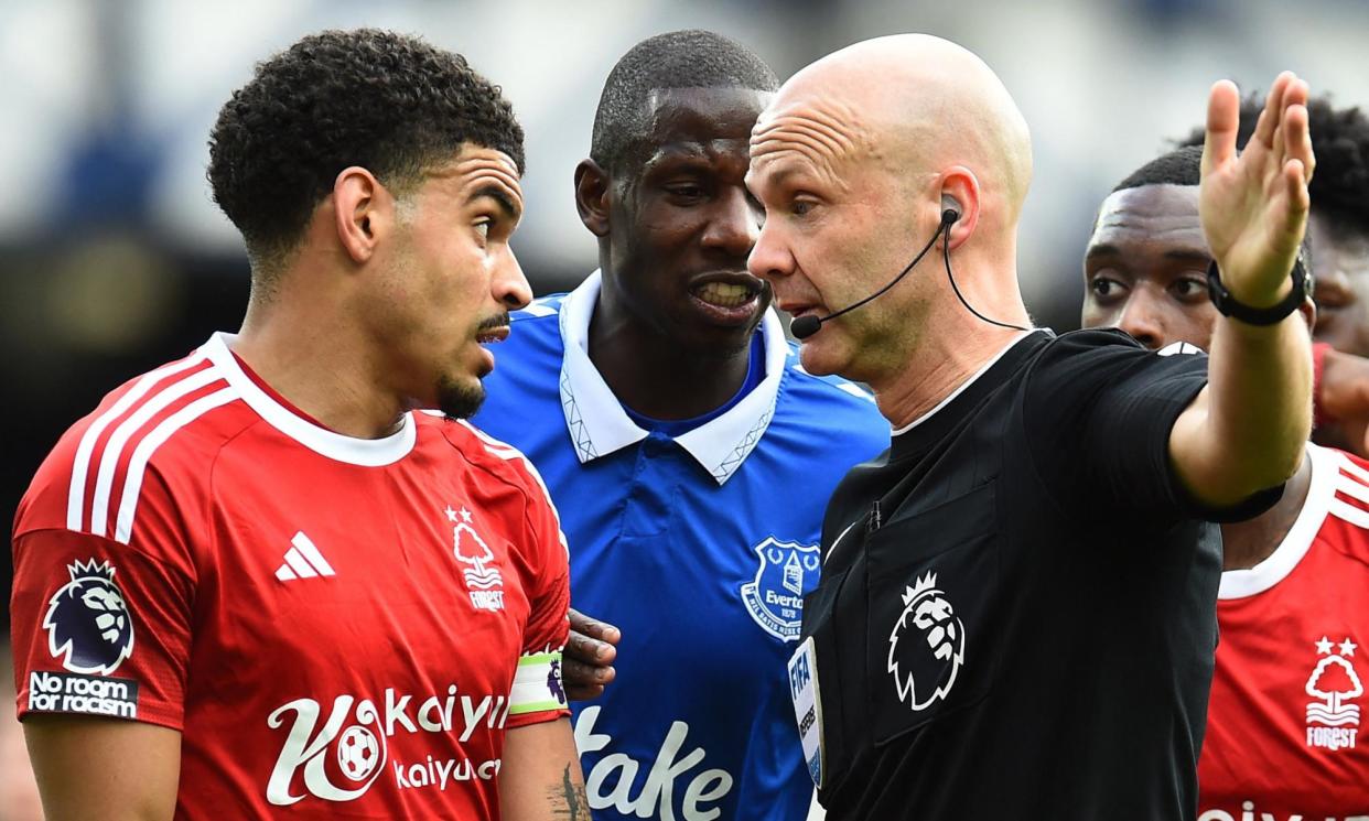 <span>Nottingham Forest's Morgan Gibbs-White remonstrates with referee Anthony Taylor.</span><span>Photograph: Peter Powell/Reuters</span>
