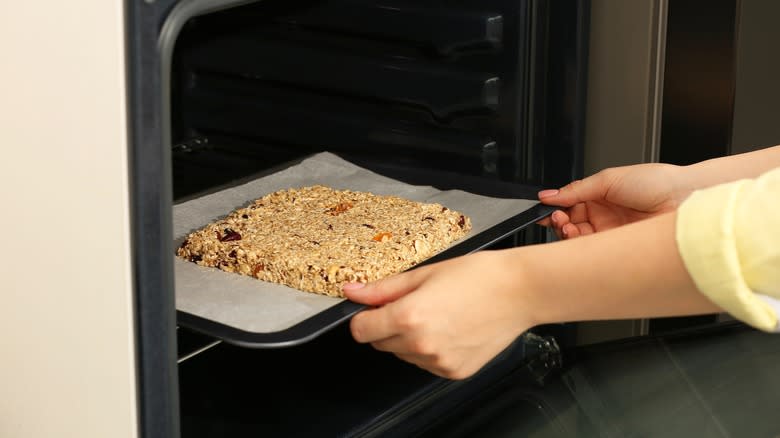 Pan of granola in oven