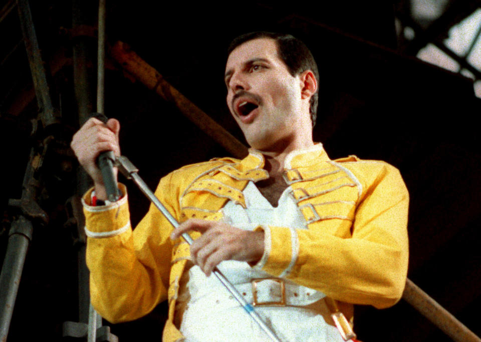 In this July 20, 1986 file photo, Queen lead singer Freddie Mercury performs, in Germany.” (AP Photo/Marco Arndt)