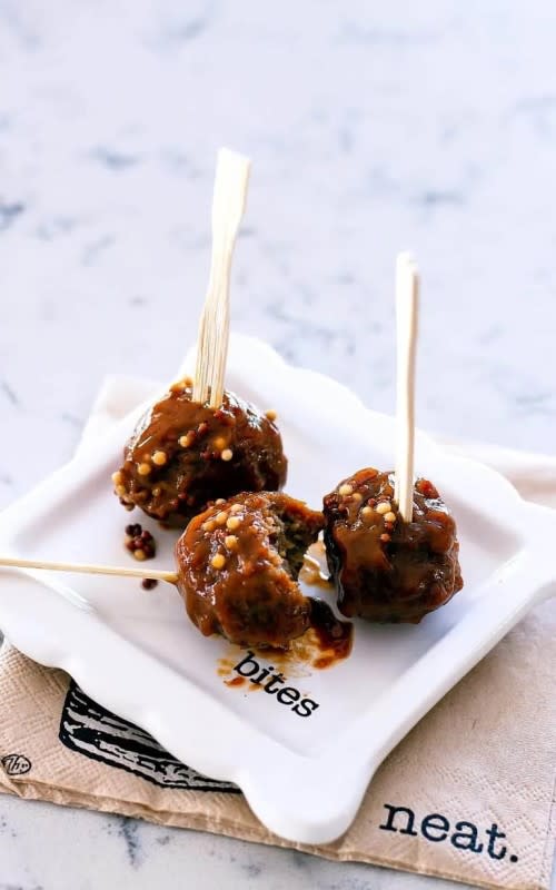 <p>Take Two Tapas</p><p>Tangy with a little sweet heat, these will be a hit at your next party.</p><p><strong>Get the recipe: <a href="https://www.taketwotapas.com/honey-mustard-meatballs-crockpot-slowcooker/" rel="nofollow noopener" target="_blank" data-ylk="slk:Honey Mustard Meatballs;elm:context_link;itc:0;sec:content-canvas" class="link rapid-noclick-resp">Honey Mustard Meatballs</a></strong></p>
