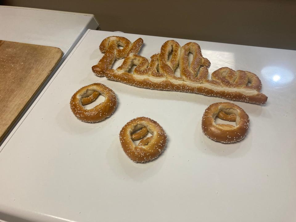 Among the shapes the Kean brothers at the Philly Pretzel Factory in Langhorne make is this Phillies logo and pretzel-shaped baseballs. Baseball and soft pretzels are a natural in the region.