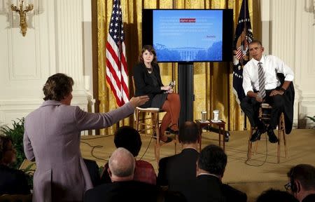 U.S. President Barack Obama takes part in a conversation co-hosted by Coworker.org following a worker summit at the White House in Washington October 7, 2015. REUTERS/Kevin Lamarque