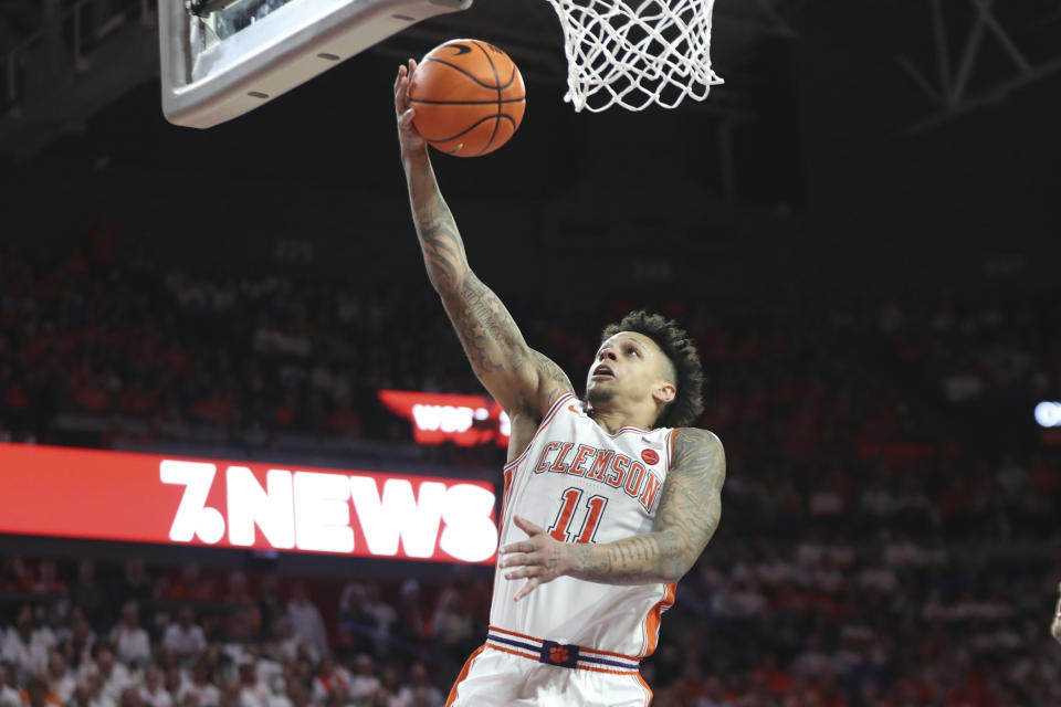 Clemson guard Brevin Galloway (11) makes a layup during the second half of an NCAA college basketball game against Duke in Clemson, S.C., Saturday, Jan. 14, 2023. (AP Photo/Artie Walker Jr.)