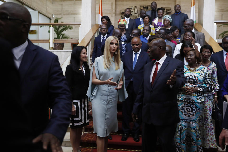 White House senior adviser Ivanka Trump, center left, talks with Ivory Coast Vice President Daniel Kablan Duncan, center right, at the end of a group photo with officials at the Presidential Palace, Tuesday April 16, 2019, in Abidjan, Ivory Coast. Trump is visiting Ethiopia and Ivory Coast to promote a White House global economic program for women. (AP Photo/Jacquelyn Martin)