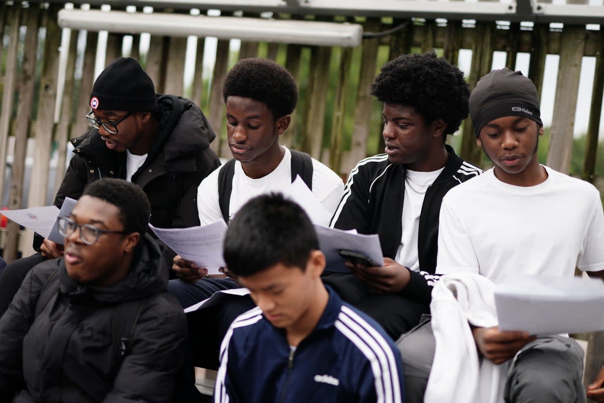 Pupils at Ark Greenwich Free School, London, receiving their GCSE results (PA)