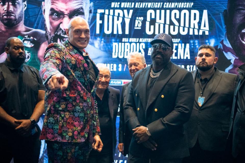 Tyson Fury (left) will fight Derek Chisora in December, having already beaten the veteran twice (Getty Images)