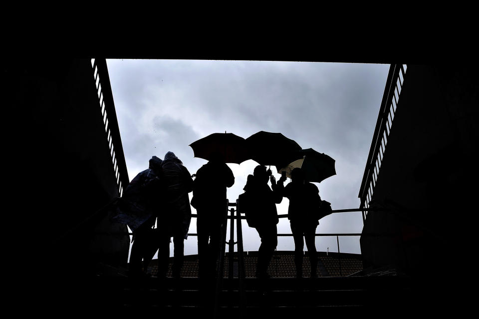 <p>Prolonged heavy rain prevents play from starting on Day Nine of the French Open at Roland Garros on May 30, 2016, in Paris. (Dennis Grombkowski/Getty Images) </p>