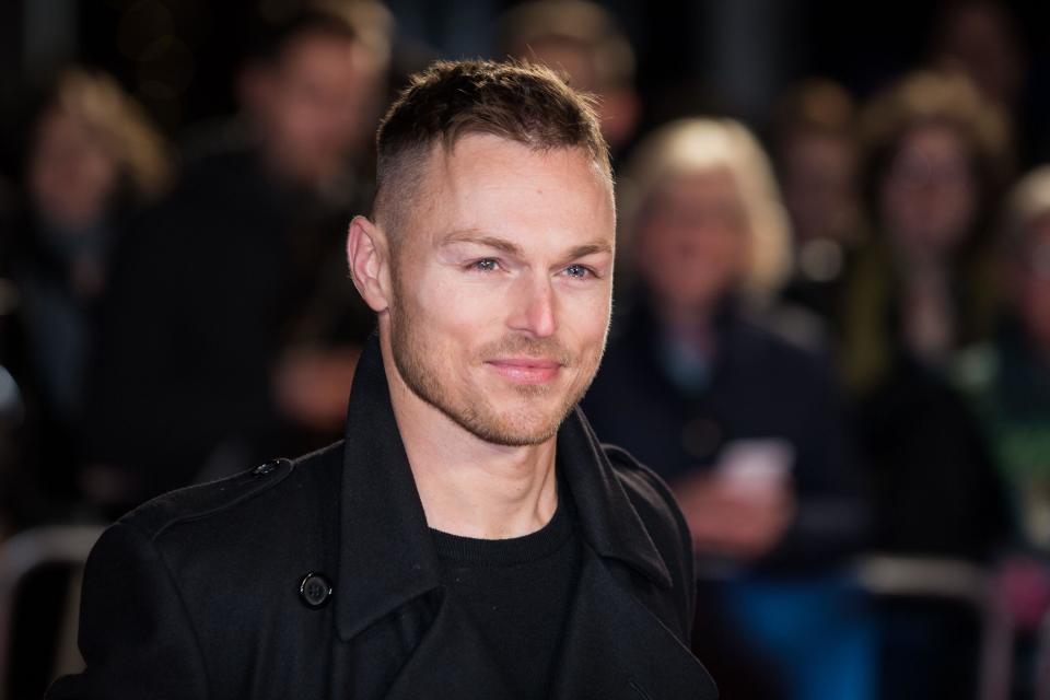 Andrew Hayden-Smith poses for photographers upon arrival at the world premiere of the film 'The Pass' in London, Wednesday, March 16, 2016. (Photo by Vianney Le Caer/Invision/AP)