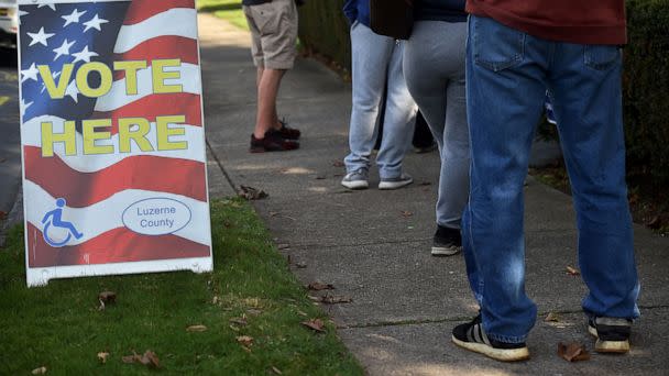 PHOTO: Voters seen line up to vote at St Aloyscious Church in Wilkes-Barre, Pa., Nov. 3, 2020. (LightRocket/Getty Images, FILE)