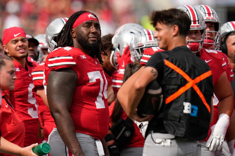 Aug 31, 2024; Columbus, OH, USA; Ohio State Buckeyes offensive lineman Donovan Jackson (74) watches from the sideline during the NCAA football game against the Akron Zips at Ohio Stadium. Ohio State won 52-6.