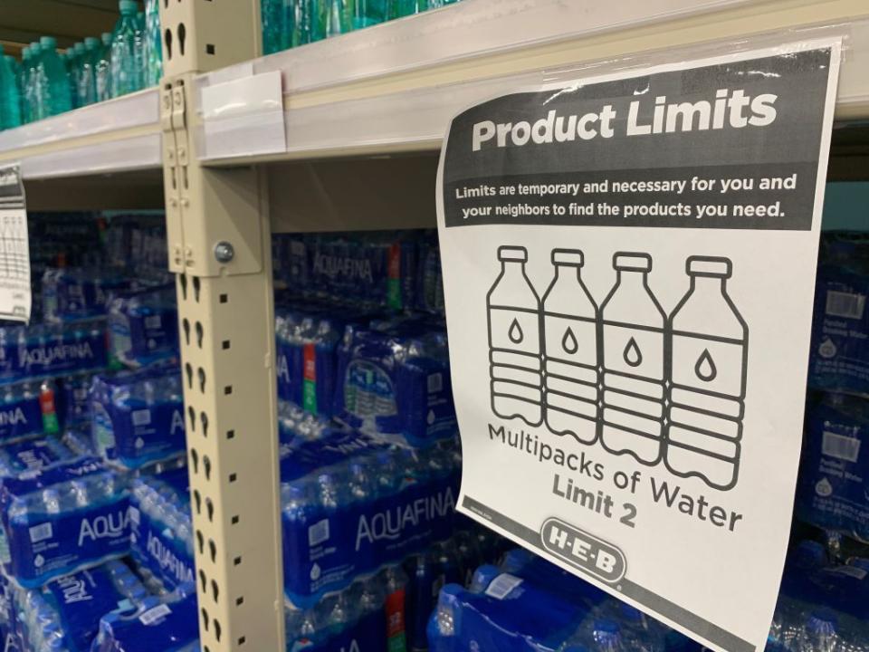 A "Product Limits" sign appears on water shelves in a Houston supermarket on Feb. 20, following a winter storm that left millions without power and caused water pipes to burst. (Photo: FRANCOIS PICARD/AFP/Getty Images)