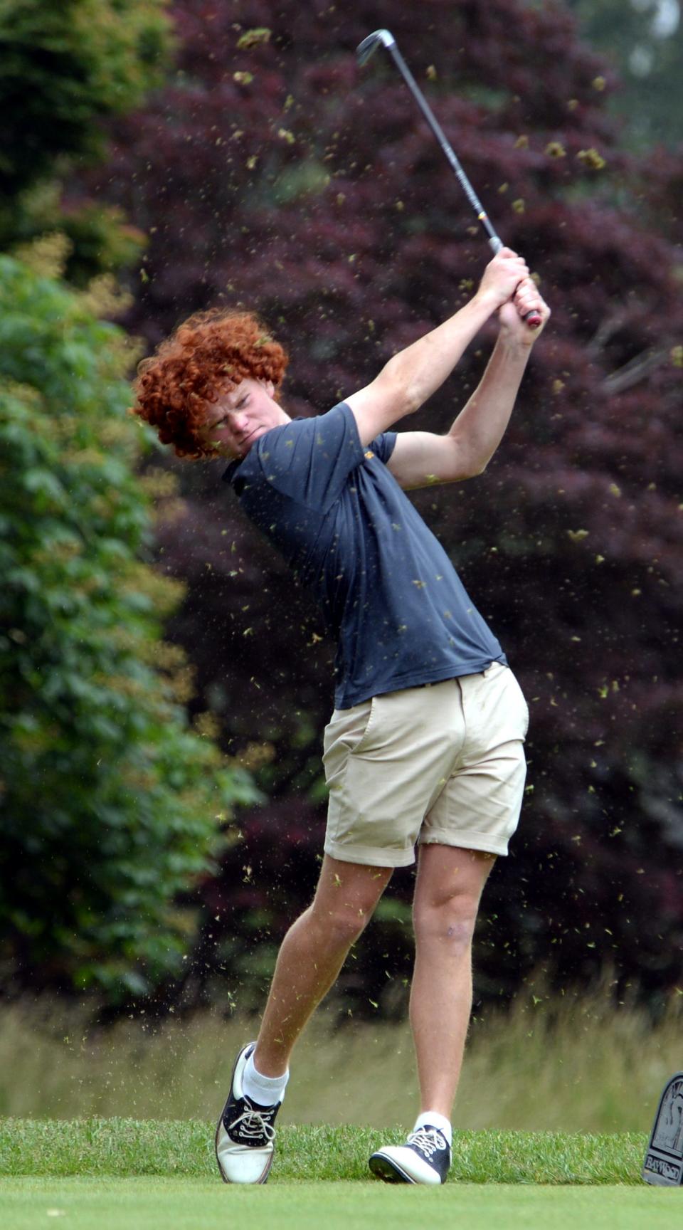 Win Thomas of Tatnall tees on the 13th hole Wednesday at the DIAA Golf Tournament at Baywood Greens Golf Club in Long Neck. Thomas shot 75-71--146 to win the boys individual title by one stroke.