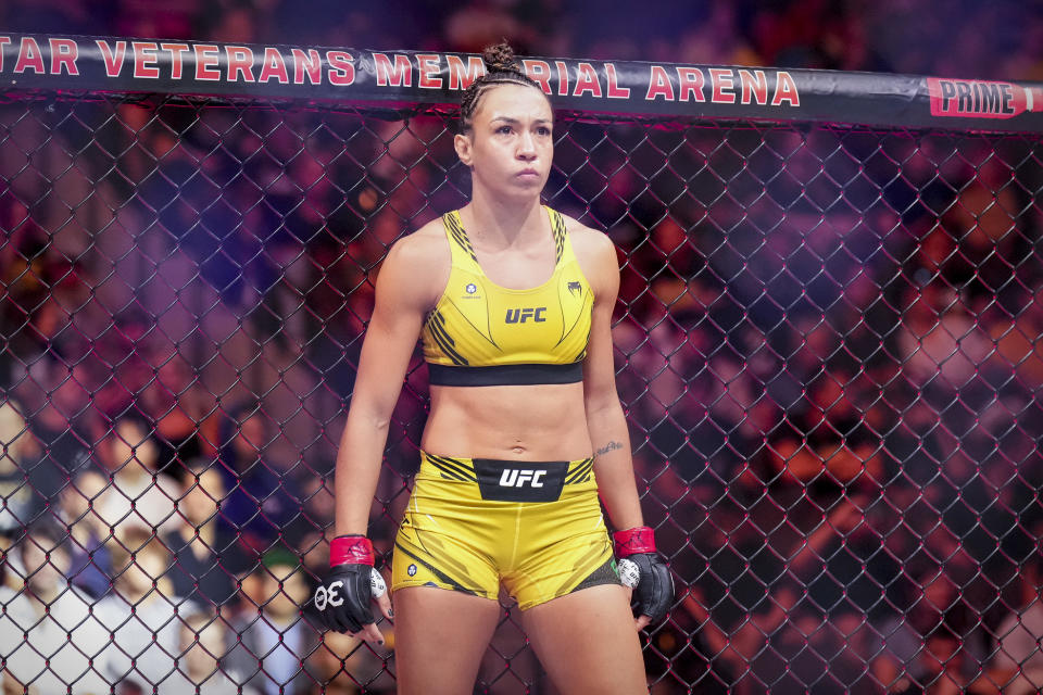 Jun 24, 2023; Jacksonville, Florida, USA; Amanda Ribas (red gloves) fights Maycee Barber (blue gloves) in a women flyweight bout during UFC Fight Night at VyStar Veterans Memorial Arena. Mandatory Credit: David Yeazell-USA TODAY Sports