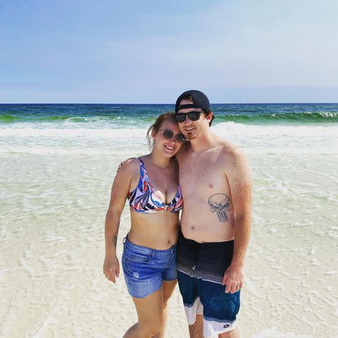 <p>Anna Cardwell Instagram</p> Anna Cardwell and Eldridge Toney on the beach in 2021.