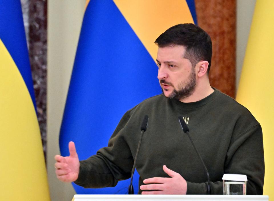 Ukrainian President Volodymyr Zelensky gestures as he speaks to media during their joint press conference with Prime Minister of Sweden following the talks in Kyiv on February 15, 2023. (Photo by Sergei SUPINSKY / AFP) (Photo by SERGEI SUPINSKY/AFP via Getty Images)