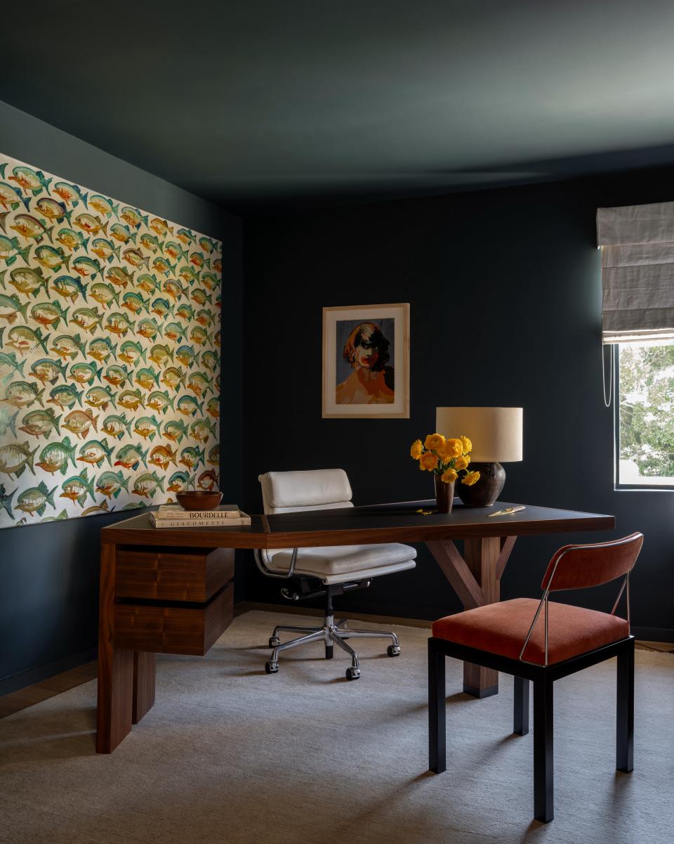 A walnut and linoleum table by Studio Muka and an Ettore Sottsass Lodge chair dressed in Maharam’s Mohair upholstery accentuate one corner of the office. A painting by Alexis Rockman, titled Parade, and a fish-patterned silkscreen by Claire Tabouret, conjure an eclectic potpourri of color and pattern. “They’re grown-up and childlike all at once,” says Neda. The rug is an Armadillo design.