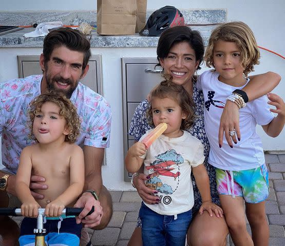 Nicole Johnson Instagram Michael Phelps and Nicole Johnson with their three children, Beckett, Maverick and Boomer