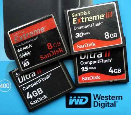 A variety of SanDisk memory cards are seen with a Western Digital hard drive box in Golden, Colorado in this photo illustration October 21, 2015. REUTERS/Rick Wilking