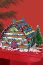 <p>Cut out larger pieces of gingerbread to create a country-style gingerbread barn. Jelly beans and M&Ms complete the look.</p>