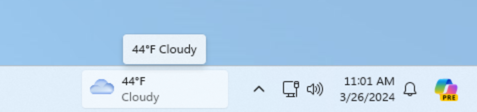 Windows 11 weather button next to the system tray