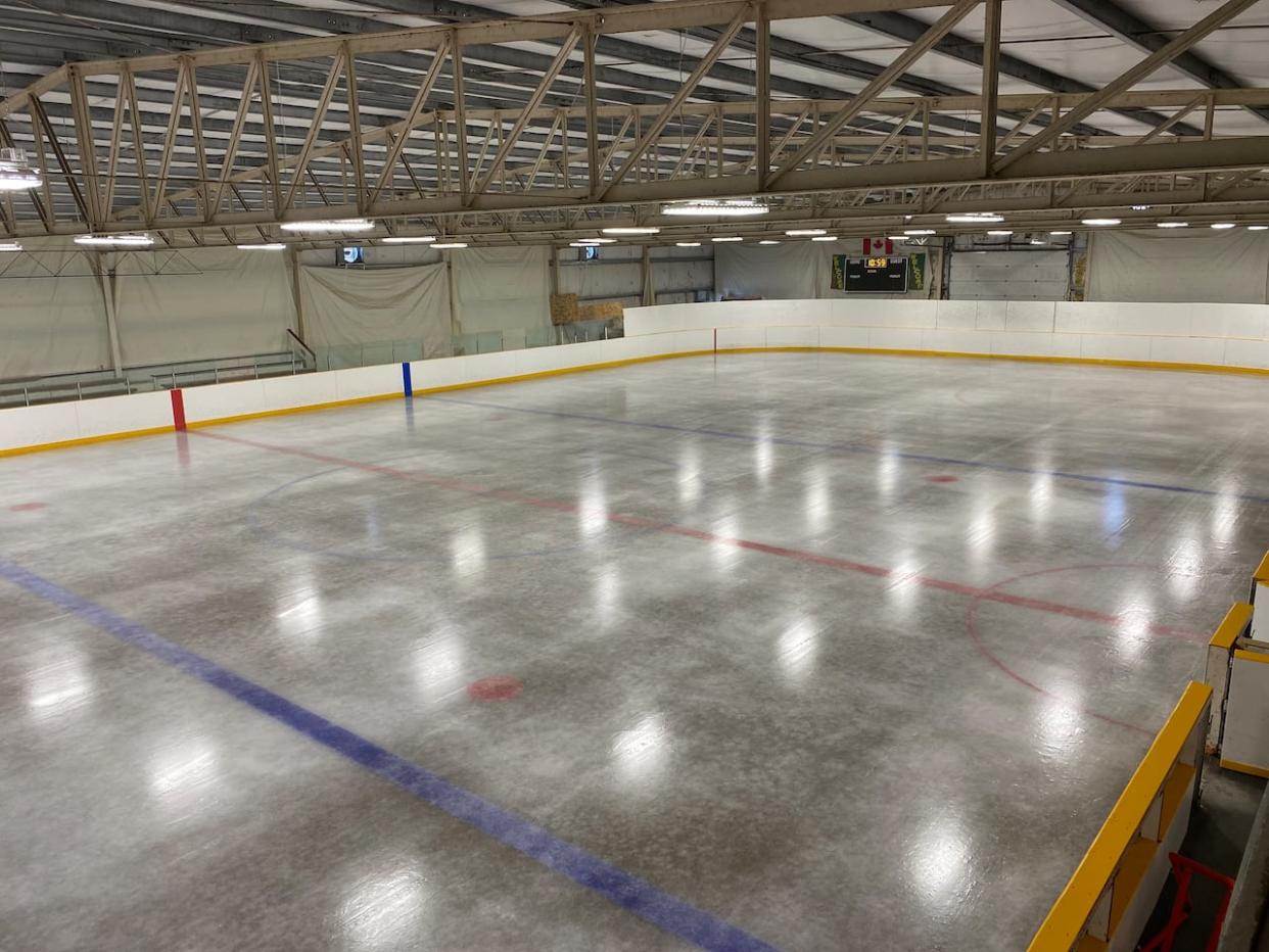 The ice rink in Radisson, Sask., is one of the few remaining natural ice rinks in the province. It's been difficult preparing it this season given the warm temperatures. (Submitted by Jenny Thompson - image credit)