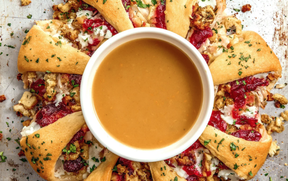 <p>Delish</p><p>Thanksgiving leftovers ring is a fun new way to enjoy turkey, cranberry sauce and your favorite side dishes all over again. </p><p><strong>Get the recipe: <a href="https://parade.com/1296088/parade/thanksgiving-leftovers-ring/" rel="nofollow noopener" target="_blank" data-ylk="slk:Thanksgiving Leftovers Ring;elm:context_link;itc:0;sec:content-canvas" class="link ">Thanksgiving Leftovers Ring</a></strong></p>