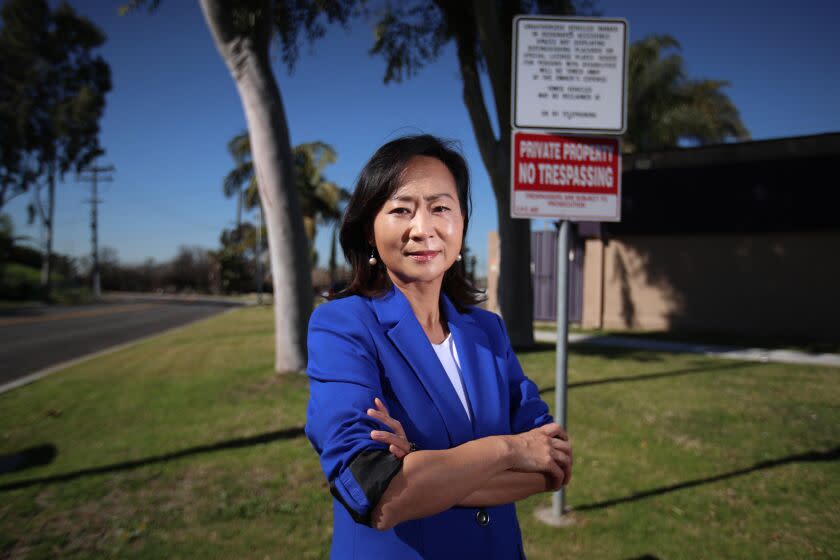 Buena Park, CA - February 09: Sunny Park stands outside of an street entrance for Smoking Tiger Bread & Coffee in Buena Park Thursday, Feb. 9, 2023. That's where a confrontation happened in 2018 between Park and a supporter of Virginia Vaughn, her opponent, where he accused her on video of stealing lawn signs that criticized her as a "carpetbagger." The allegation led to a petty theft charge and was dismissed in court but not before it fueled the recall campaign against Park. In October 2022, the Orange County District Attorney's office filed 33 criminal charges against three people involved in a 2019 campaign to recall former Buena Park City Councilwoman Sunny Park. Back then, Park accused the campaign of inflaming anti-Asian racism in the northern Orange County city that has changed politically and demographically leading up to her election. (Allen J. Schaben / Los Angeles Times)