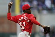 Cincinnati Reds starting pitcher Reiver Sanmartin (52) works against the Atlanta Braves in the first inning of a baseball game Friday, April 8, 2022, in Atlanta. (AP Photo/John Bazemore)