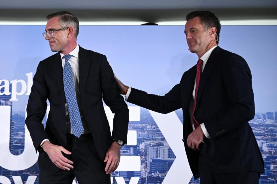 NSW premier Dominic Perrottet (left) and NSW Labor leader Chris Minns shake hands following a Q&A session in Sydney on 2 March.