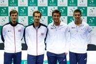 Britain Tennis - Great Britain v Argentina - Davis Cup Semi Final - Emirates Arena, Glasgow, Scotland - 15/9/16 Great Britain's Jamie Murray, Andy Murray, Argentina's Leonardo Mayer and Federico Delbonis pose after the draw Action Images via Reuters / Andrew Boyers Livepic