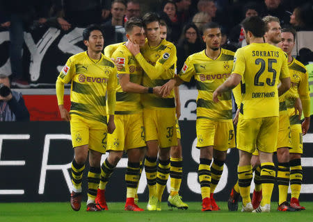 Soccer Football - Bundesliga - VfB Stuttgart vs Borussia Dortmund - Mercedes-Benz Arena, Stuttgart, Germany - November 17, 2017 Borussia Dortmund’s Maximilian Philipp celebrates scoring their first goal with team mates REUTERS/Kai Pfaffenbach