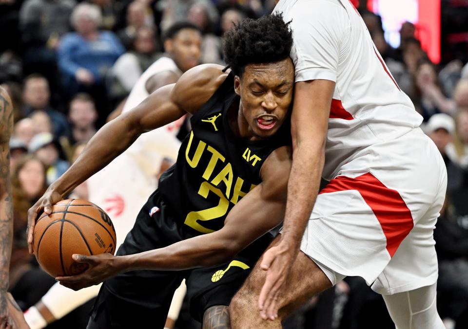 Utah Jazz guard <a class="link " href="https://sports.yahoo.com/nba/players/6019" data-i13n="sec:content-canvas;subsec:anchor_text;elm:context_link" data-ylk="slk:Collin Sexton;sec:content-canvas;subsec:anchor_text;elm:context_link;itc:0">Collin Sexton</a> (2) is guarded by Toronto Raptors center <a class="link " href="https://sports.yahoo.com/nba/players/6354" data-i13n="sec:content-canvas;subsec:anchor_text;elm:context_link" data-ylk="slk:Jontay Porter;sec:content-canvas;subsec:anchor_text;elm:context_link;itc:0">Jontay Porter</a> (11) as the Jazz and Raptors play at the Delta Center in Salt Lake City on Friday, Jan. 12, 2024. | Scott G Winterton, Deseret News