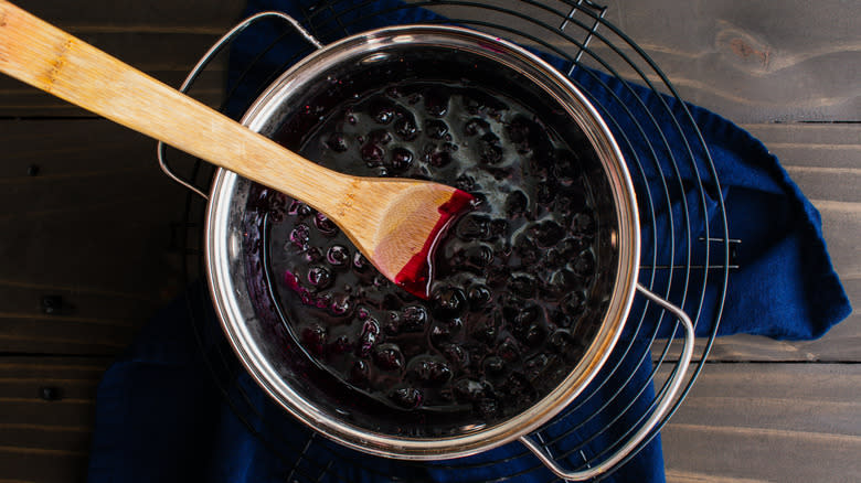 pot with blueberry syrup