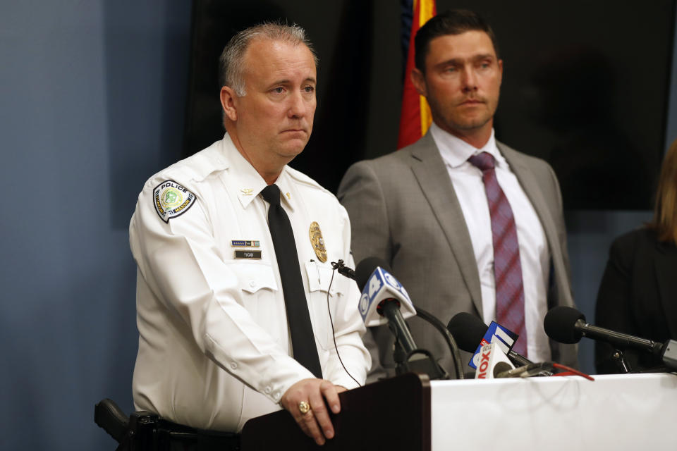 Florissant Police Chief Timothy Fagan, left, speaks alongside St. Charles County Prosecuting Attorney Tim Lohmar, right, during a news conference Wednesday, June 17, 2020, in O'Fallon, Mo. Lohmar, who is acting as special prosecutor in the case against former Florissant Detective Joshua Smith, announced Smith has been charged with two counts of assault and armed criminal action after the now fired detective was apparently captured on video hitting a suspect with a police SUV then kicking and punching the man. (AP Photo/Jeff Roberson)