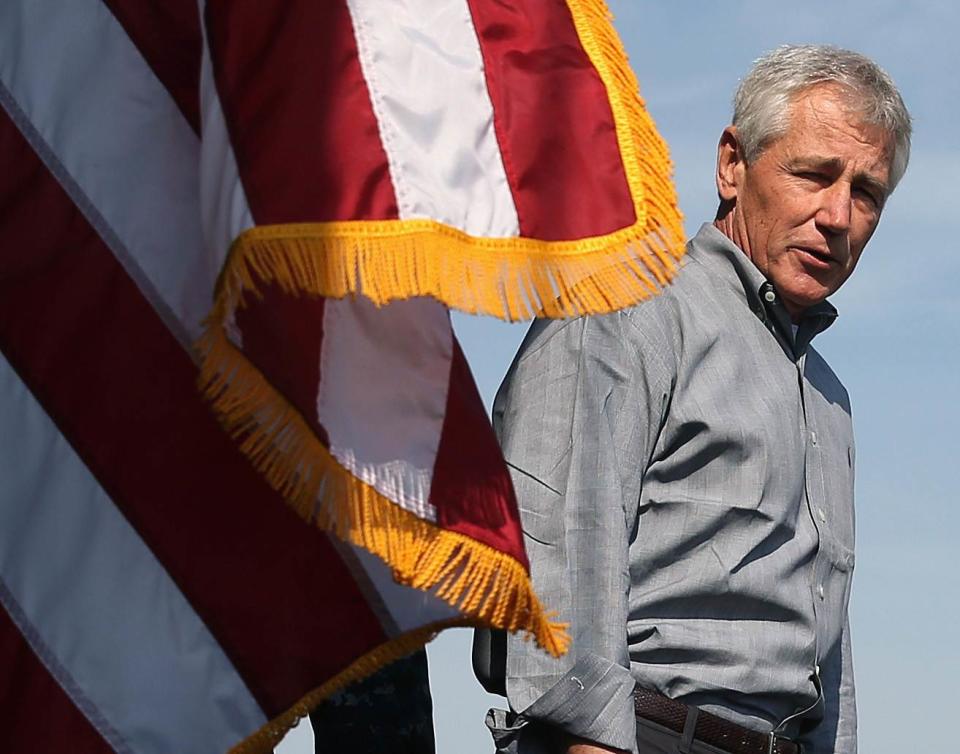 U.S. Secretary of Defense Chuck Hagel speaks to military servicemembers aboard the USS Ponce in Manama