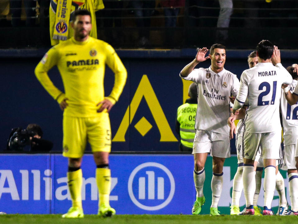 Ronaldo celebrates his second half-goal with his team-mates: AFP/Getty