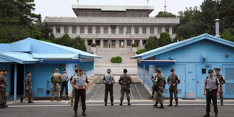 korea DMZ Soldiers of South Korea and the U.S. stand guard during a commemorative ceremony for the 64th anniversary of the signing of the Korean War Armistice Agreement at the truce village of Panmunjom in the Demilitarized Zone (DMZ) dividing the two Koreas.