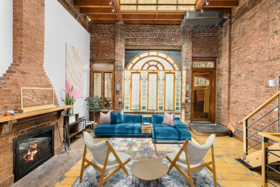 An image inside the dazzling carriage house, which features dramatic heights and old-world touches. Real Estate Production Network