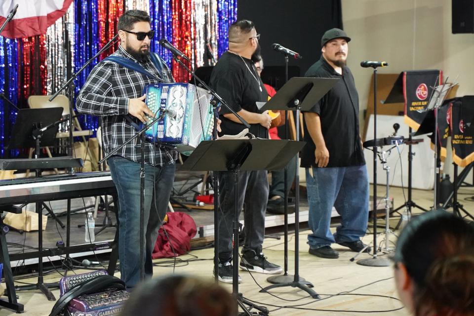 Members of the Los Hermanos are seen performing earlier in July at the River Raisin Ragtime Revue in Adrian on the campus of PlaneWave Instruments. Band members pictured are, from left, Cristobal Najar, Alejandro Cresencio and Sergio Villegas.