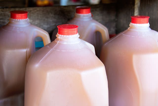 <p>Getty</p> Stock image of gallon-sized bottles of juice.