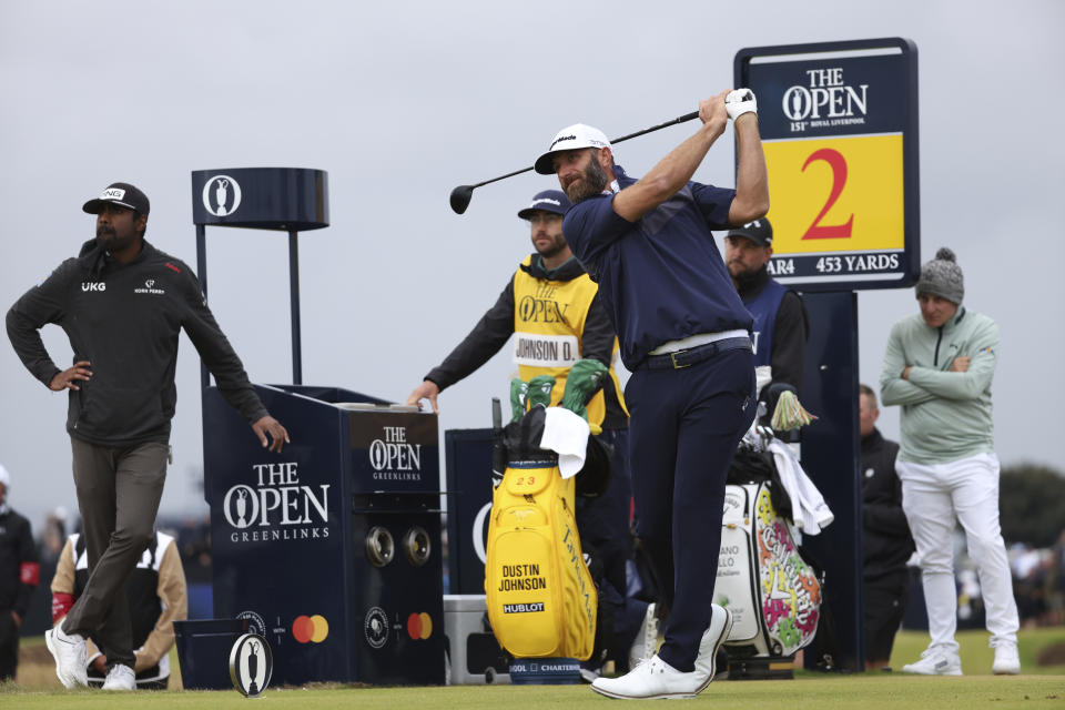 United States' Dustin Johnson tees off from the 2nd hole during the second day of the British Open Golf Championships at the Royal Liverpool Golf Club in Hoylake, England, Friday, July 21, 2023. (AP Photo/Peter Morrison)