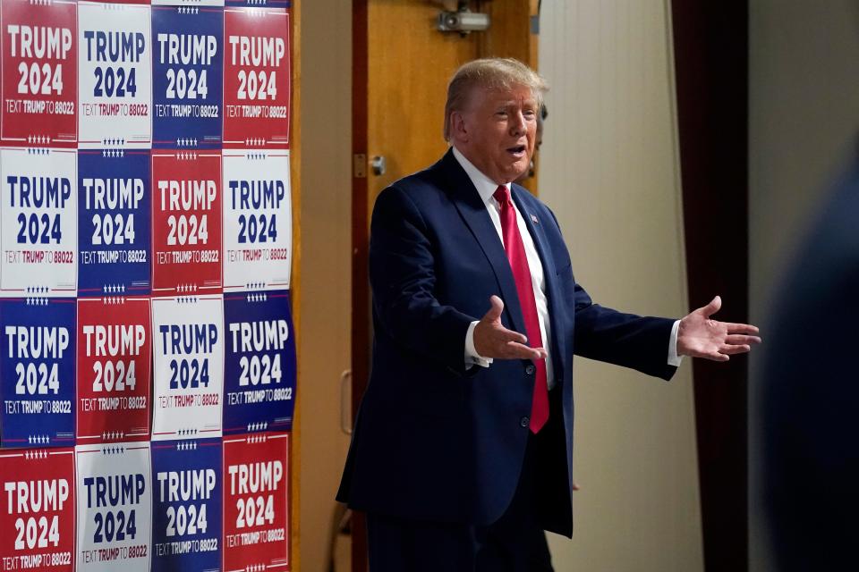 Former President Donald Trump arrives for a commit to caucus rally, Wednesday, Sept. 20, 2023, in Maquoketa, Iowa. (AP Photo/Charlie Neibergall)