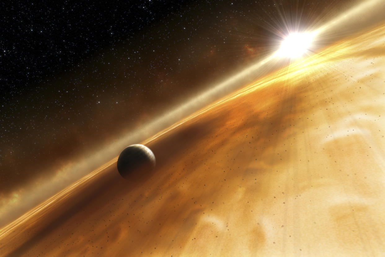 Artist's concept of the star Fomalhaut and the Jupiter-type planet that the Hubble Space Telescope observed. A ring of debris appears to surround Fomalhaut as well. The planet, called Fomalhaut b, orbits the 200-million-year-old star every 872 years.